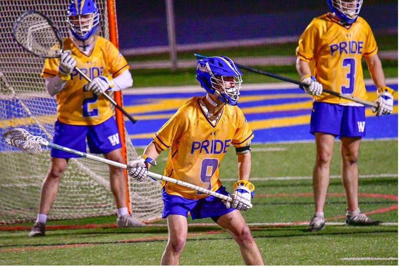 Cole with lacrosse teammates